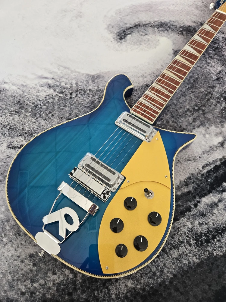 High-quality electric guitar, gradient blue, rosewood fingerboard, stainless steel frets, 6-string 660 guitar, free shipping
High-quality electric guitar, gradient blue, rosewood fingerboard, stainless steel frets, 6-string 660 guitar, free shipping
