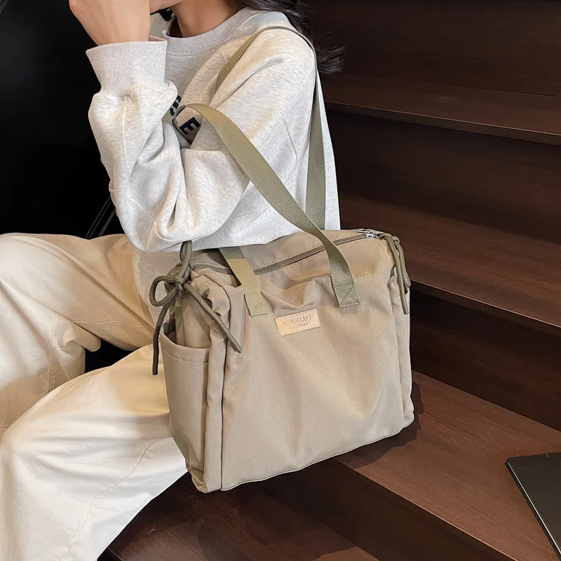 Elegant Women's Canvas Shoulder Bag Large Tote Handbag Lightweight Durable Crossbody Purse for Work Commute Shopping Beach Trip
Elegant Women's Canvas Shoulder Bag Large Tote Handbag Lightweight Durable Crossbody Purse for Work Commute Shopping Beach Trip