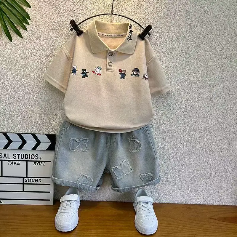 Boys' Summer Set Children's Fashionable and Handsome PoLo Shirt Boys' Short Sleeved T-shirt Denim Shorts Two-piece Set
Boys' Summer Set Children's Fashionable and Handsome PoLo Shirt Boys' Short Sleeved T-shirt Denim Shorts Two-piece Set