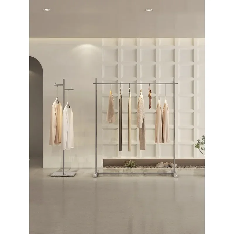 Custom-made stainless steel clothing store display rack women's shop display props Nakajima shelf ripple floor hanger
Custom-made stainless steel clothing store display rack women's shop display props Nakajima shelf ripple floor hanger