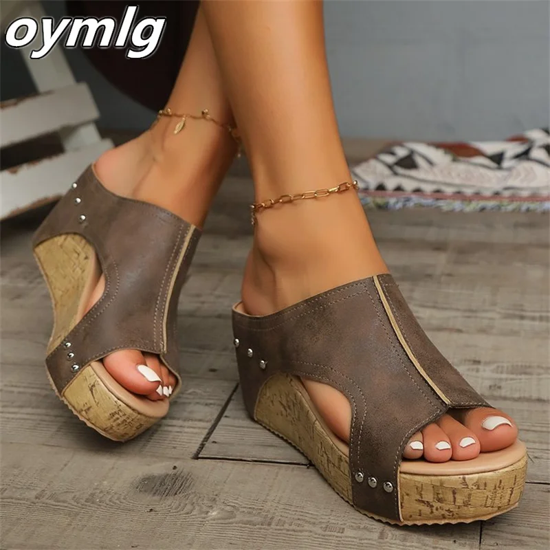 Slope heel sandals 2024 summer new retro thick soled Roman sandals women's large fish mouth sponge cake slippers
Slope heel sandals 2024 summer new retro thick soled Roman sandals women's large fish mouth sponge cake slippers