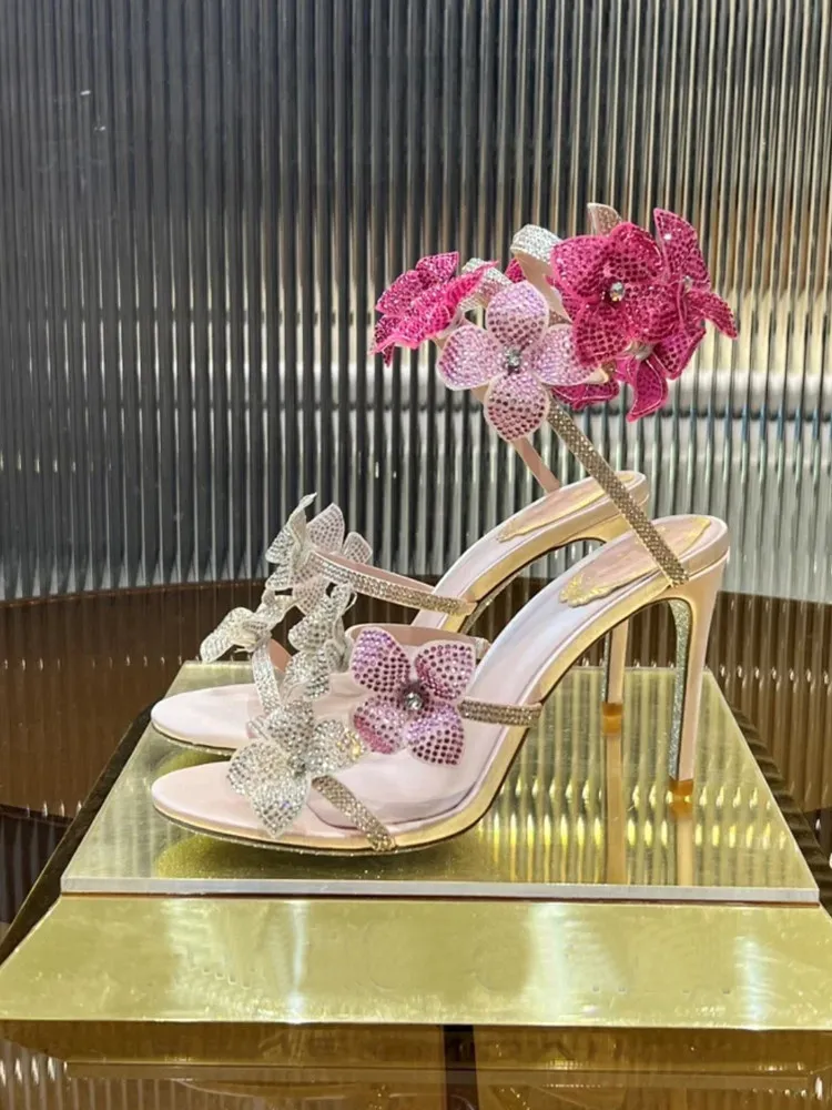 Versatile Rhinestone Snake-shaped Winding Lace Flower High Heels Women's 2026 New Sexy Stiletto Socialite One-word Belt Sandals
Versatile Rhinestone Snake-shaped Winding Lace Flower High Heels Women's 2026 New Sexy Stiletto Socialite One-word Belt Sandals
