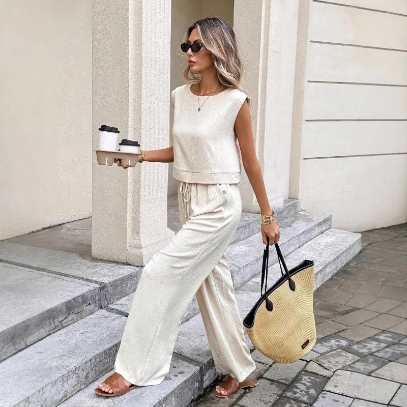 Women's Summer 2 Piece Set Sleeveless Round Neck Back Button Top and Drawstring Wide Leg Pants Casual Outfit
Women's Summer 2 Piece Set Sleeveless Round Neck Back Button Top and Drawstring Wide Leg Pants Casual Outfit