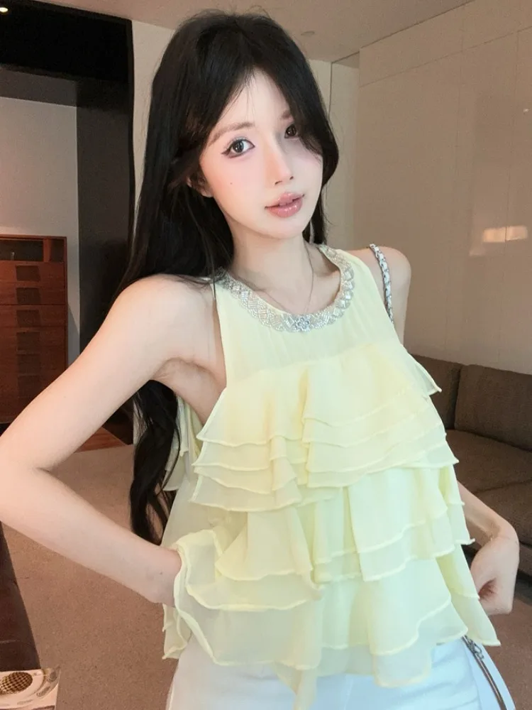 Sweet Style Ruffle Hem Short Sleeveless Chiffon Top Women's Summer New Fashion Small Audience Vest Loose Fit Splicing Citywalk
Sweet Style Ruffle Hem Short Sleeveless Chiffon Top Women's Summer New Fashion Small Audience Vest Loose Fit Splicing Citywalk