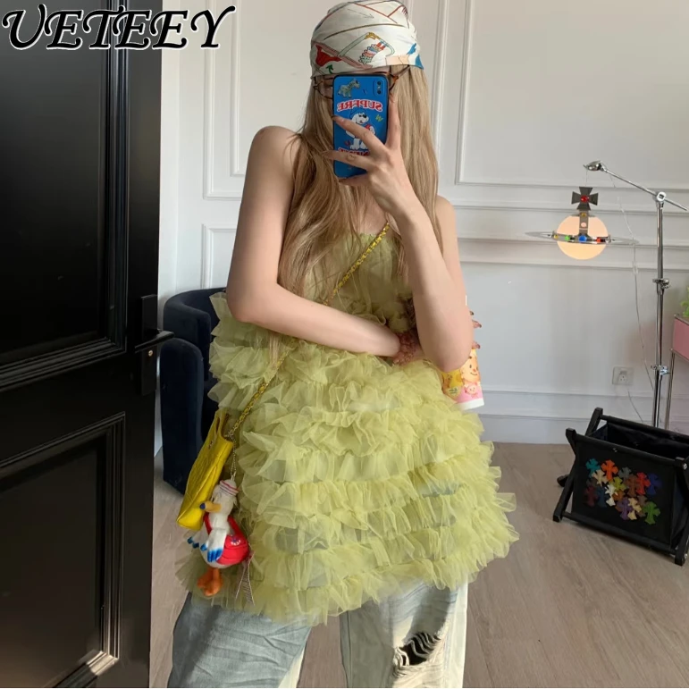 Solid Color Heavy Industry Mesh Yarn Fluffy Suspender Dress Women High Sense Versatile Sweet Pure Desire Short Dresses 
Solid Color Heavy Industry Mesh Yarn Fluffy Suspender Dress Women High Sense Versatile Sweet Pure Desire Short Dresses