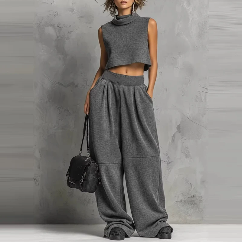 Элегантный повседневный спортивный костюм-двойка для женщин: свободный пуловер с воротником-стойкой и брюки, однотонный, без рукавов
Элегантный повседневный спортивный костюм-двойка для женщин: свободный пуловер с воротником-стойкой и брюки, однотонный, без рукавов
