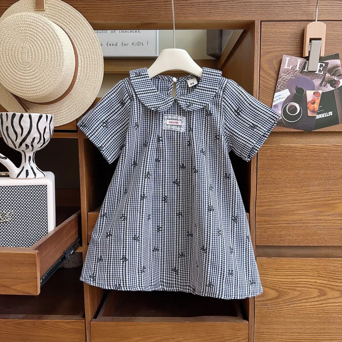 Girls' Korean Version 2025 Dress Summer New Children's Forest Style Doll Collar Printed Checkered Short Sleeved Princess Dress
Girls' Korean Version 2025 Dress Summer New Children's Forest Style Doll Collar Printed Checkered Short Sleeved Princess Dress