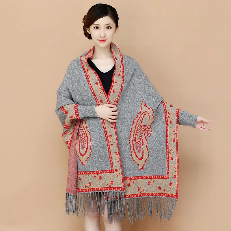 Winter scarf women shawl cloak jacket autumn outer with red tassel belt sleeves printing casual warm long dual-use poncho tops
Winter scarf women shawl cloak jacket autumn outer with red tassel belt sleeves printing casual warm long dual-use poncho tops