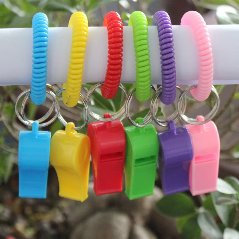 Sport Whistle With Bracelet Loud Clear Plastic Whistles With Stretchable Coil Wrist Key Chains Survival Safety Whistle Keychain
Sport Whistle With Bracelet Loud Clear Plastic Whistles With Stretchable Coil Wrist Key Chains Survival Safety Whistle Keychain