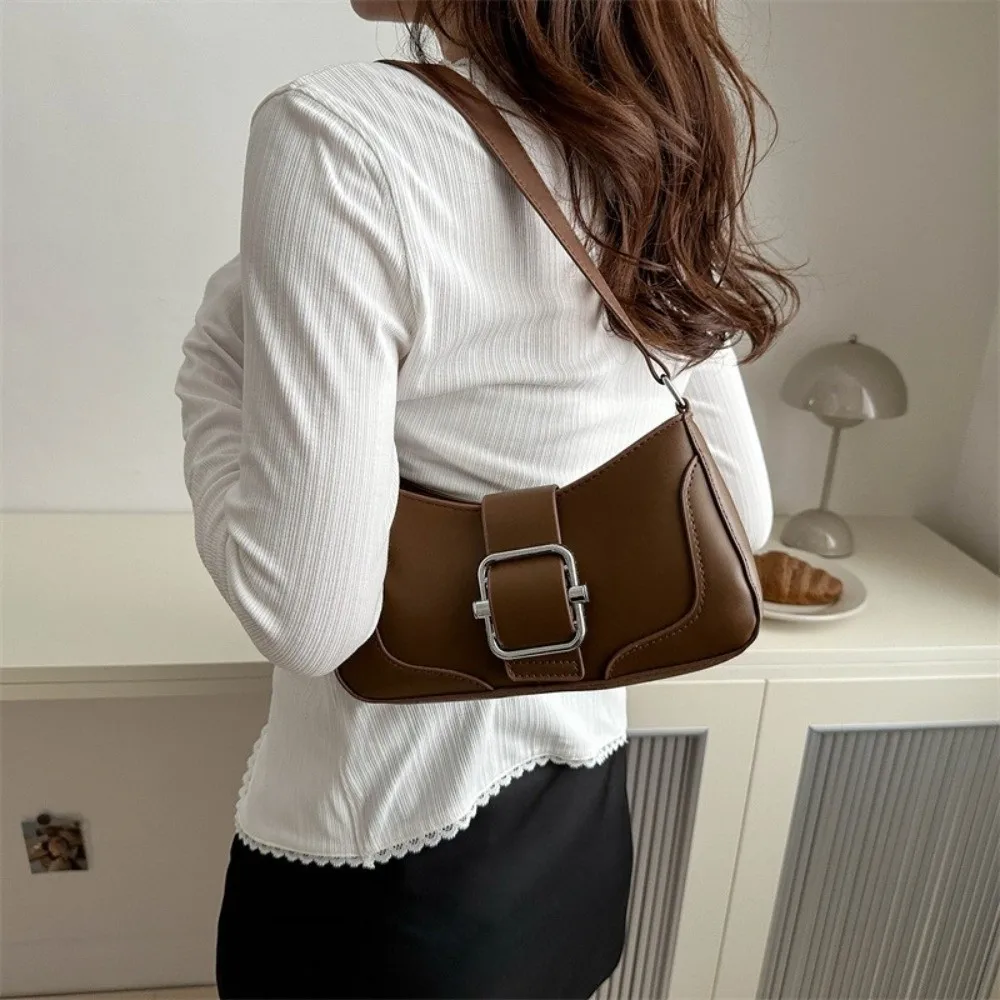 Portable Vintage Buckle Shoulder Bag Solid Color Y2k Women's Armpit Bag Leisure Cuasal PU Leather Handbag Purses
Portable Vintage Buckle Shoulder Bag Solid Color Y2k Women's Armpit Bag Leisure Cuasal PU Leather Handbag Purses