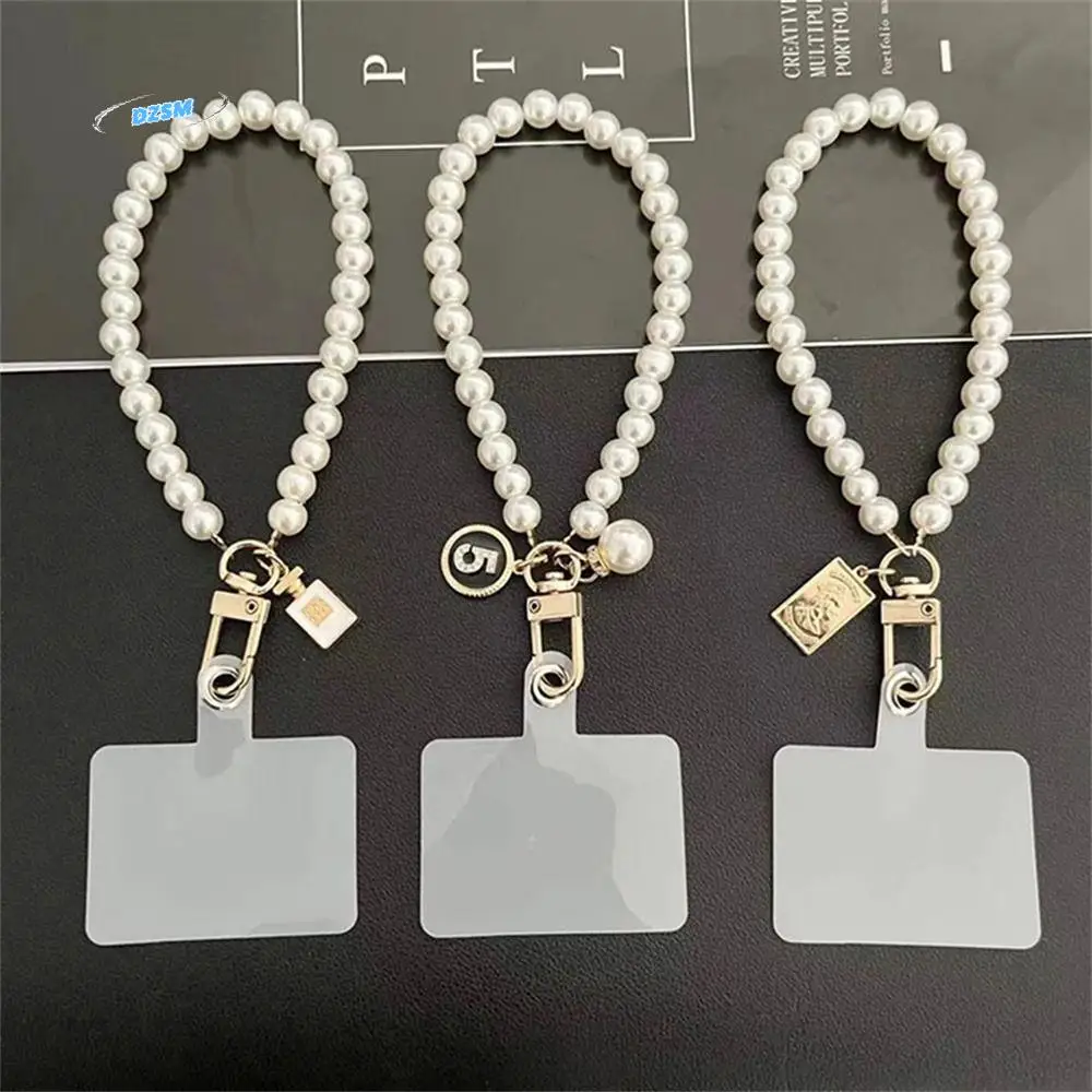 Hanging Jewelry Hand Rope Cell Phone Bracelet Pearl Lanyard Strap Short Pearl Lanyard Mobile Phone Lanyard Pearl Wrist Strap
Hanging Jewelry Hand Rope Cell Phone Bracelet Pearl Lanyard Strap Short Pearl Lanyard Mobile Phone Lanyard Pearl Wrist Strap