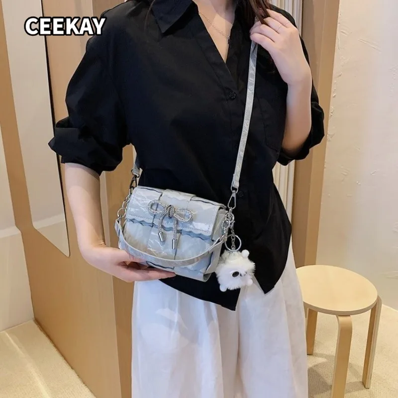 CEEKAY Solid Glossy Crinkled PU Mini Flap Cross Bag Scalloped Edge Rhinestone Bow Front Decor Wide Adjustable PU Strap Fluffy
CEEKAY Solid Glossy Crinkled PU Mini Flap Cross Bag Scalloped Edge Rhinestone Bow Front Decor Wide Adjustable PU Strap Fluffy