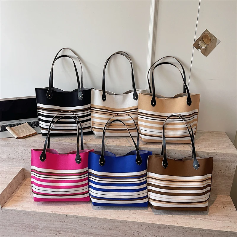 Striped Woven Handbag Large Capacity Bag For Women Bohemian Beach Shoulder Bag Simple Portable Fabric Shopping Tote Bag
Striped Woven Handbag Large Capacity Bag For Women Bohemian Beach Shoulder Bag Simple Portable Fabric Shopping Tote Bag