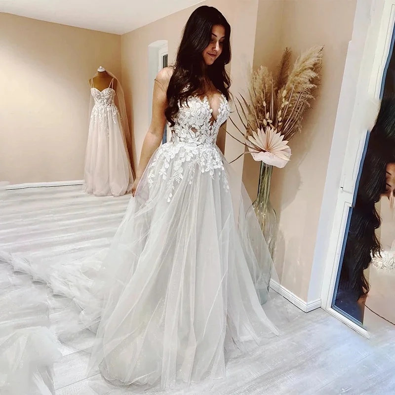 A Line Tulle Wedding Dress with V Neck Bridal Gown Beach Bridal Gown Trouwjurk Robe De Mariee
A Line Tulle Wedding Dress with V Neck Bridal Gown Beach Bridal Gown Trouwjurk Robe De Mariee