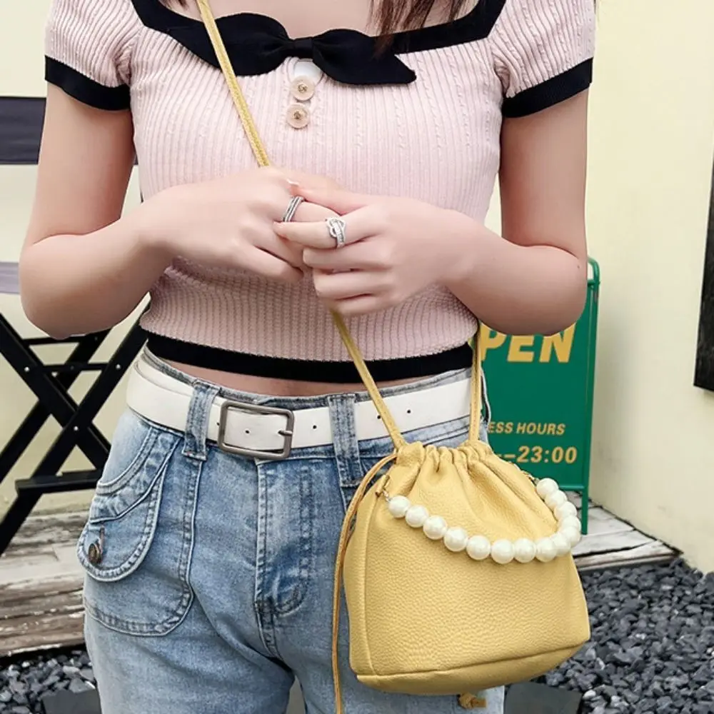 Soild Color Drawstring Bucket Bag Single Shoulder Ancient Style PU Leather Handbag Lipstick Storage Bag Handbag
Soild Color Drawstring Bucket Bag Single Shoulder Ancient Style PU Leather Handbag Lipstick Storage Bag Handbag