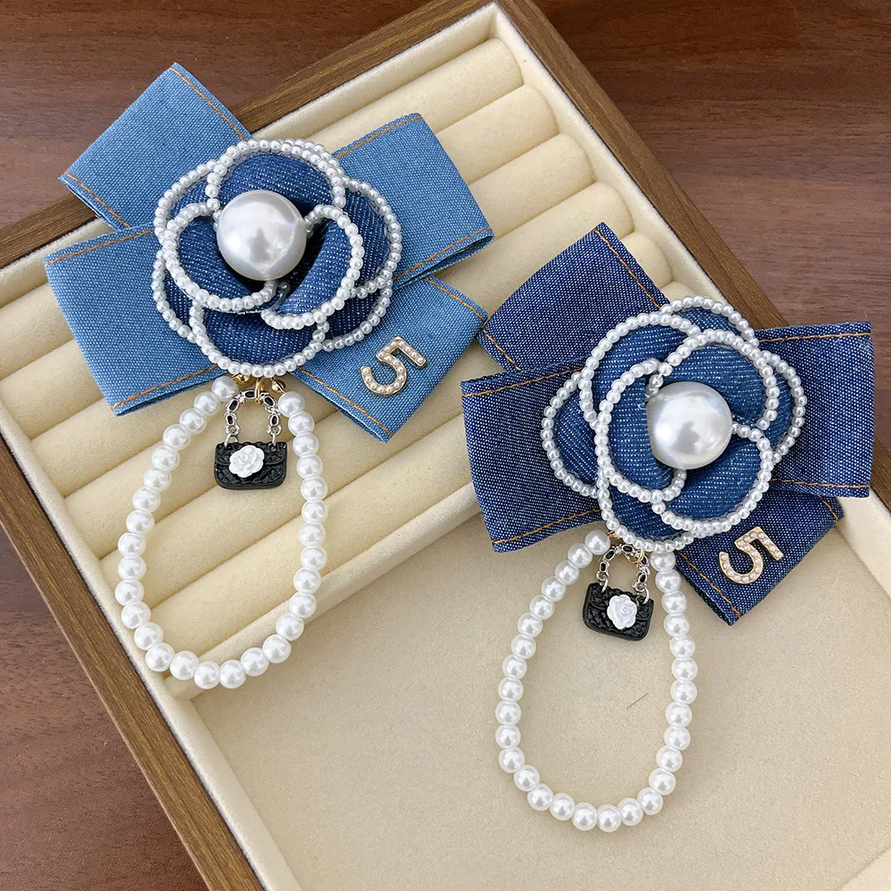 Korean Fabric Cowboy Bow Brooch Camellia Pearl Tassel Bowknot Fashion Pin for Dress Shirt Badge Fashion Accessories Gifts
Korean Fabric Cowboy Bow Brooch Camellia Pearl Tassel Bowknot Fashion Pin for Dress Shirt Badge Fashion Accessories Gifts