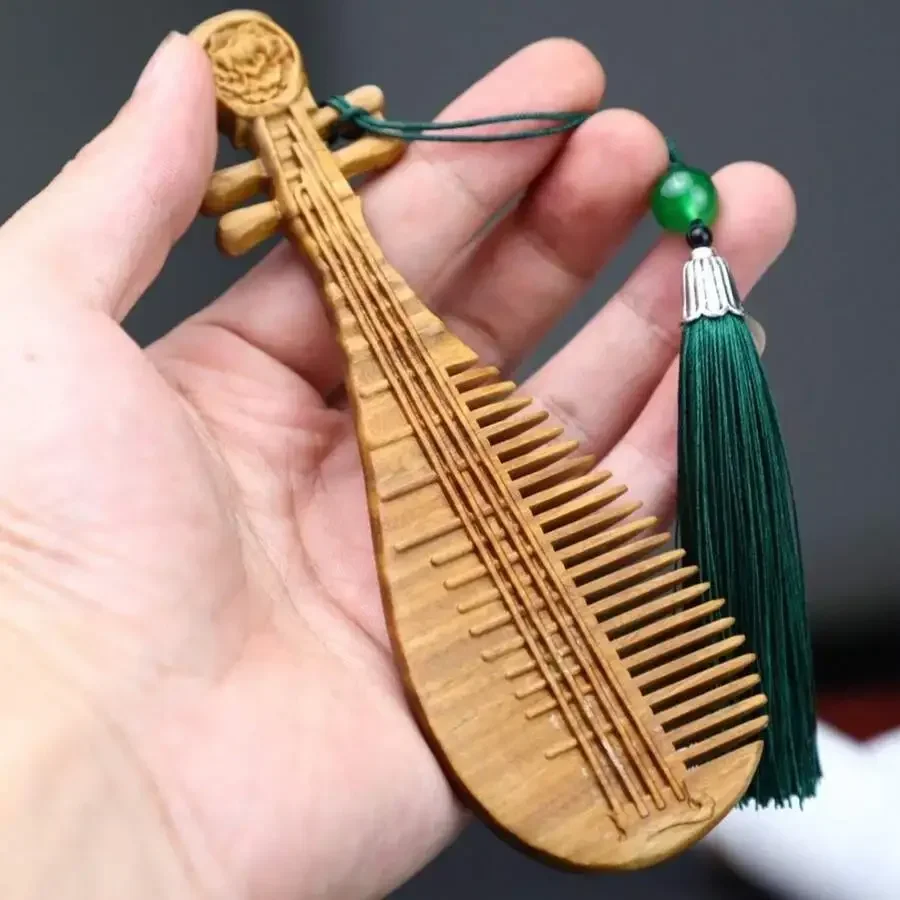 Green Sandalwood Carved Guzheng Style Wooden Hair Comb For Women Decorative Craft Ornament
Green Sandalwood Carved Guzheng Style Wooden Hair Comb For Women Decorative Craft Ornament