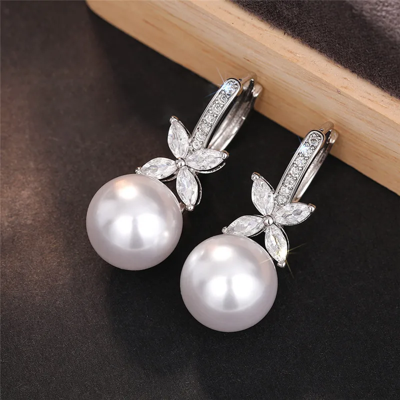 925 Sterling Silver Pearl Drop Earrings for Women Aesthetic Dazzling Cubic Zirconia Accessories Noble Charms Wedding Jewelry
925 Sterling Silver Pearl Drop Earrings for Women Aesthetic Dazzling Cubic Zirconia Accessories Noble Charms Wedding Jewelry