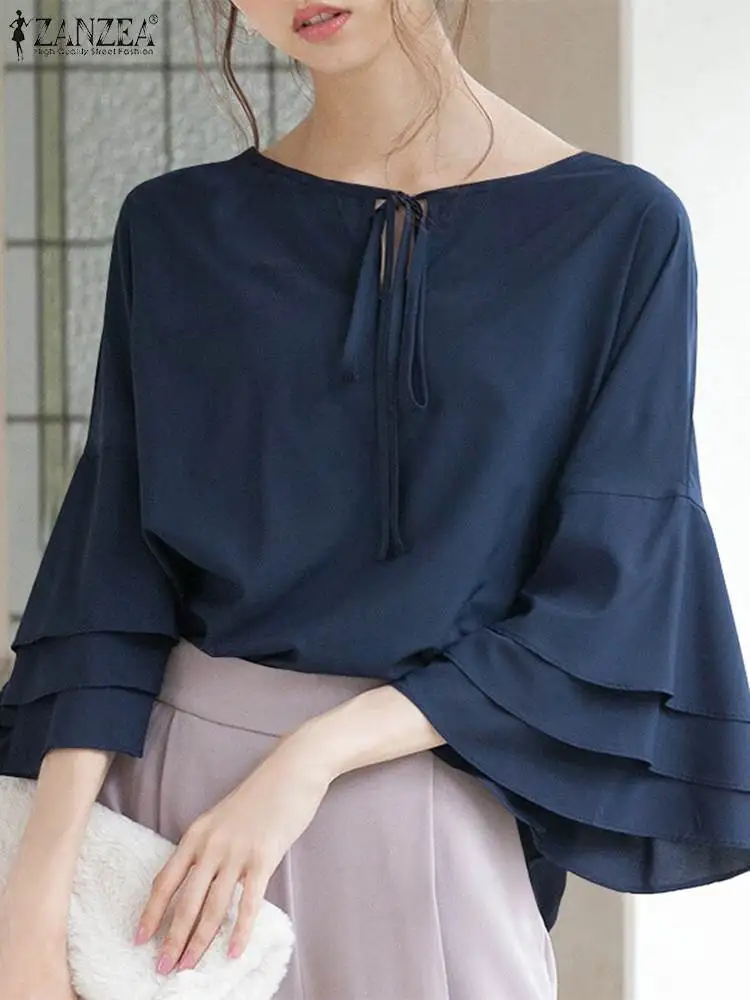 ZANZEA 2024 Fashion Solid Loose Tunics Women Flare Sleeve Blouse Vintage Summer Lace-up Neck Tops Casual Office Female Blusas
ZANZEA 2024 Fashion Solid Loose Tunics Women Flare Sleeve Blouse Vintage Summer Lace-up Neck Tops Casual Office Female Blusas