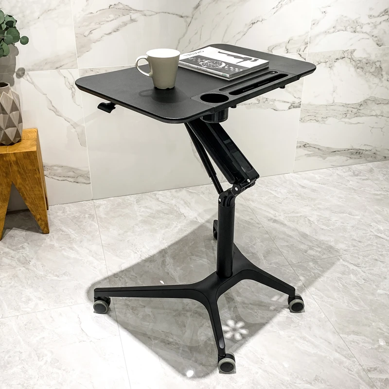 Pneumatic lifting table Standing simple automatic sofa Movable lazy desk by the bed Solid wood lecture table
Pneumatic lifting table Standing simple automatic sofa Movable lazy desk by the bed Solid wood lecture table