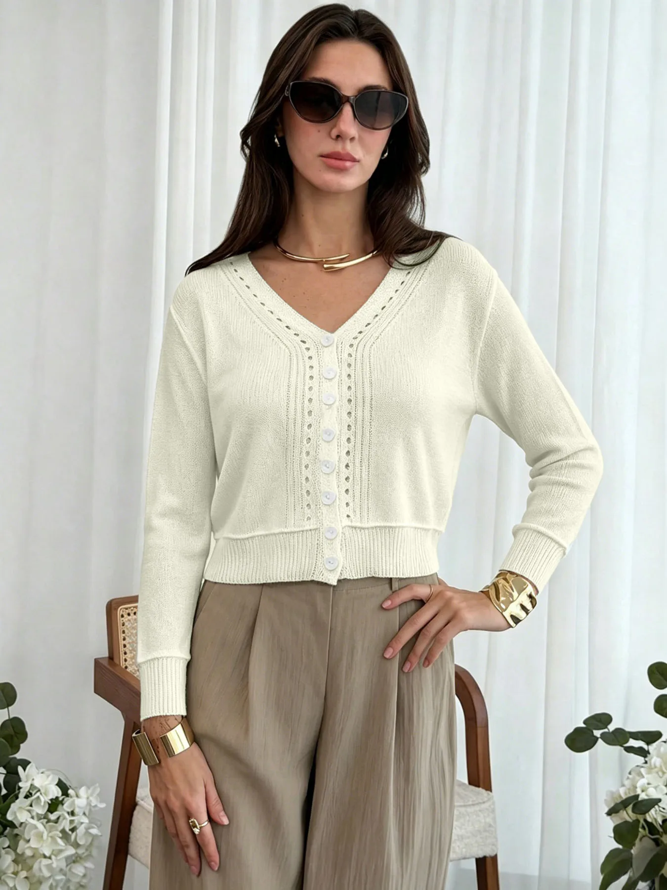 Women's Cream V Neck Knit Cardigan Long Sleeve Button Front Eyelet Detail Cropped Casual Top
Women's Cream V Neck Knit Cardigan Long Sleeve Button Front Eyelet Detail Cropped Casual Top