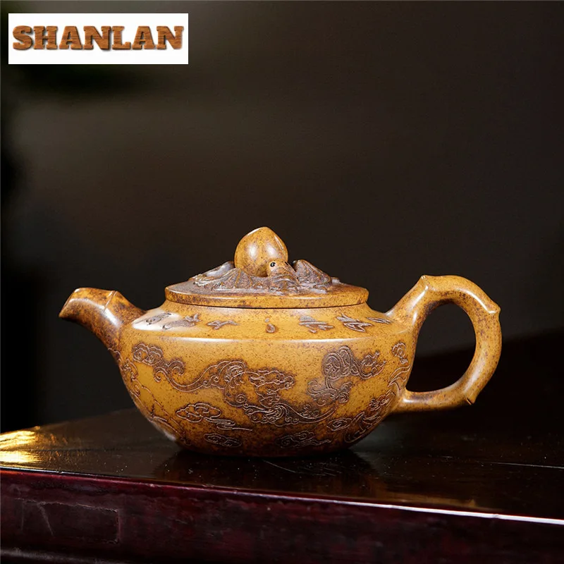 340 мл Креативные чайники Исин из фиолетовой глины, горшок ручной работы с персиком удачей, киль из необработанной руды, золотой песок, грязевой чайник, чайник Zisha, посуда
340 мл Креативные чайники Исин из фиолетовой глины, горшок ручной работы с персиком удачей, киль из необработанной руды, золотой песок, грязевой чайник, чайник Zisha, посуда