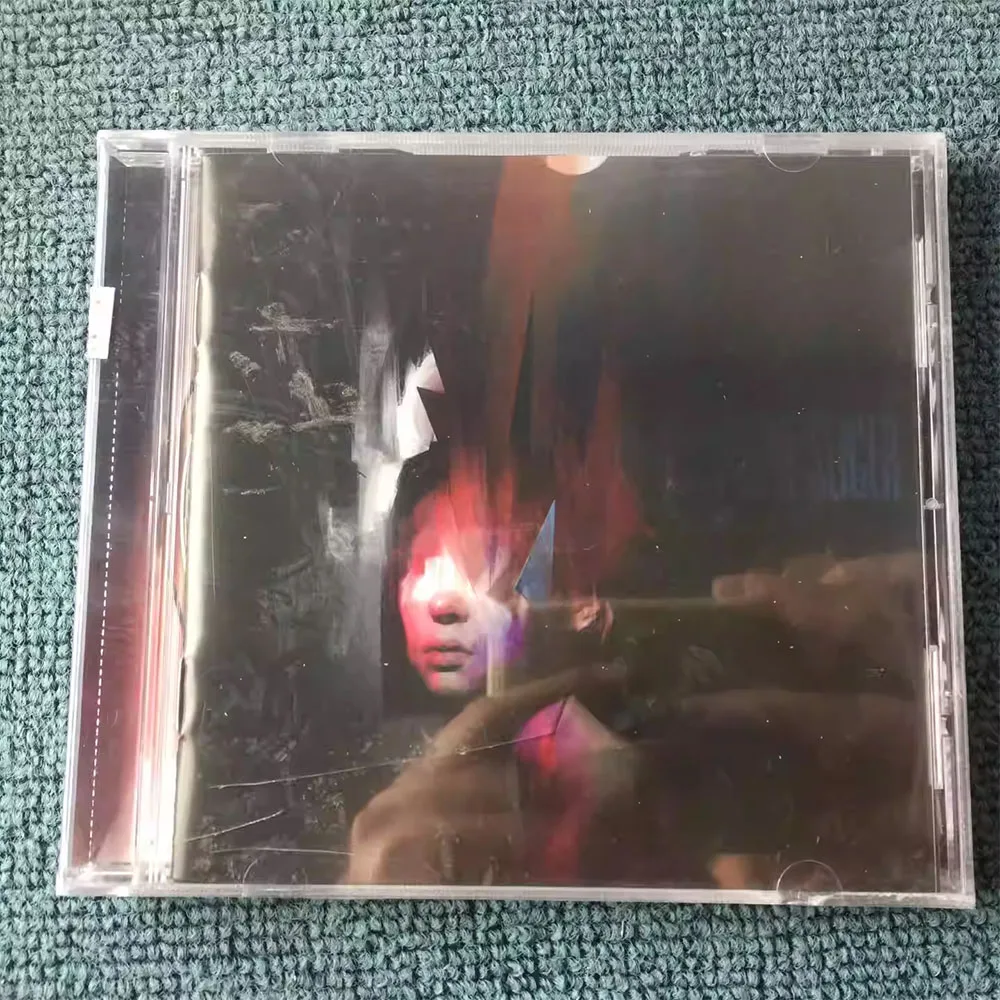 CD Blossom Pupil Slicer This Album Features A Striking Glitch-art Cover with A Distorted, Fragmented Human Portrait,rendered
CD Blossom Pupil Slicer This Album Features A Striking Glitch-art Cover with A Distorted, Fragmented Human Portrait,rendered