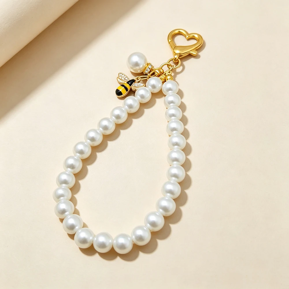Women's Light Luxury Pearl Beaded Phone Wrist Strap Anti-lost Handheld Lanyard Minimalist Charms Keychain for All Cell Phone
Women's Light Luxury Pearl Beaded Phone Wrist Strap Anti-lost Handheld Lanyard Minimalist Charms Keychain for All Cell Phone