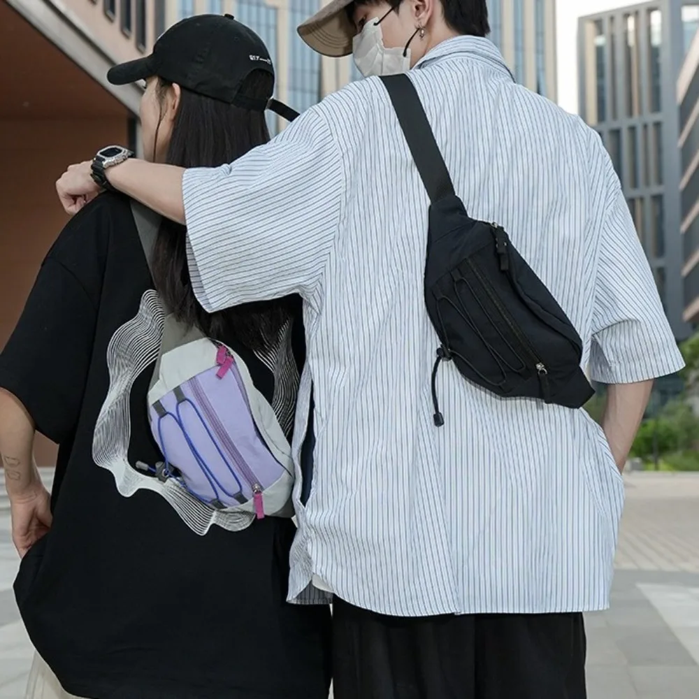 Лоскутная мужская нагрудная сумка контрастного цвета, нейлоновая эстетичная уличная поясная сумка, сумка через плечо в японском стиле, спортивная прогулочная сумка для путешествий
Лоскутная мужская нагрудная сумка контрастного цвета, нейлоновая эстетичная уличная поясная сумка, сумка через плечо в японском стиле, спортивная прогулочная сумка для путешествий