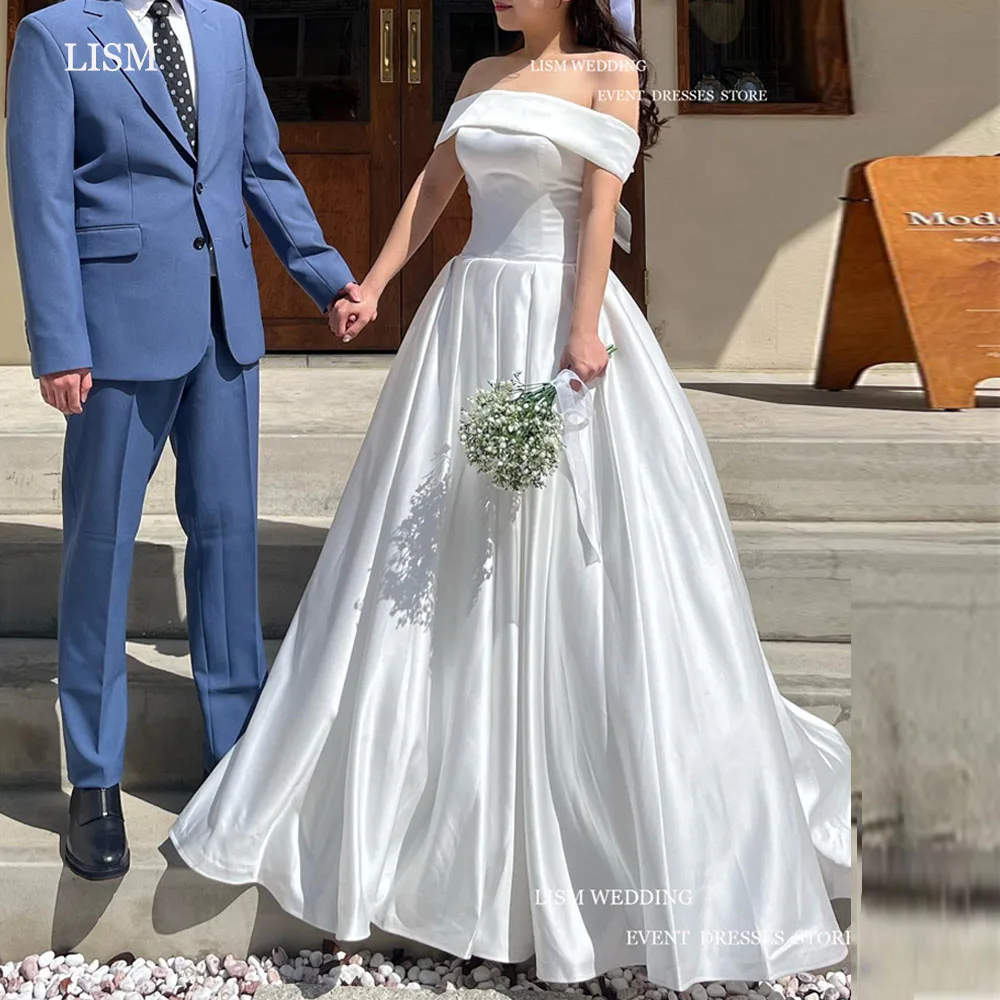 LISM Elegant Satin A Line Wedding Dresses Off The Shoulder Boat Neck Bride Dress Pleats Backless Custom Bridal Gowns
LISM Elegant Satin A Line Wedding Dresses Off The Shoulder Boat Neck Bride Dress Pleats Backless Custom Bridal Gowns