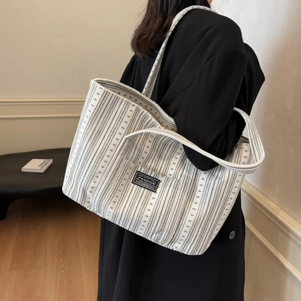 Large Capacity Canvas Tote Bag Minority Design Portable Commuting Shoulder Bag All-match Original Stripe Handbag Office Workers
Large Capacity Canvas Tote Bag Minority Design Portable Commuting Shoulder Bag All-match Original Stripe Handbag Office Workers