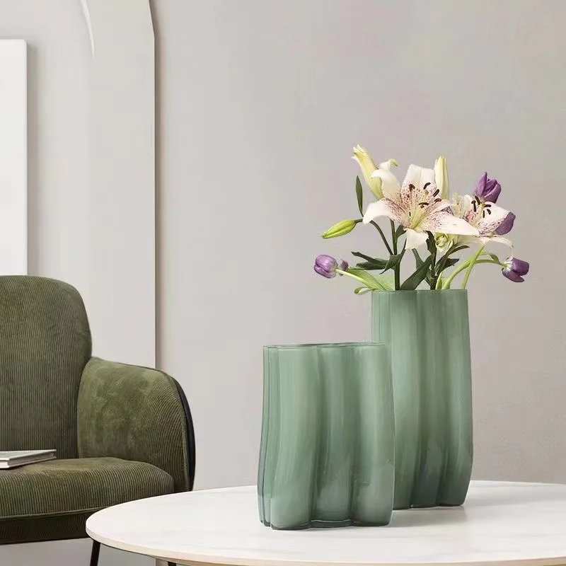 Milk green high-end vertical grain glass vase, modern and minimalist inset, home, living room, flower sample room decoration
Milk green high-end vertical grain glass vase, modern and minimalist inset, home, living room, flower sample room decoration