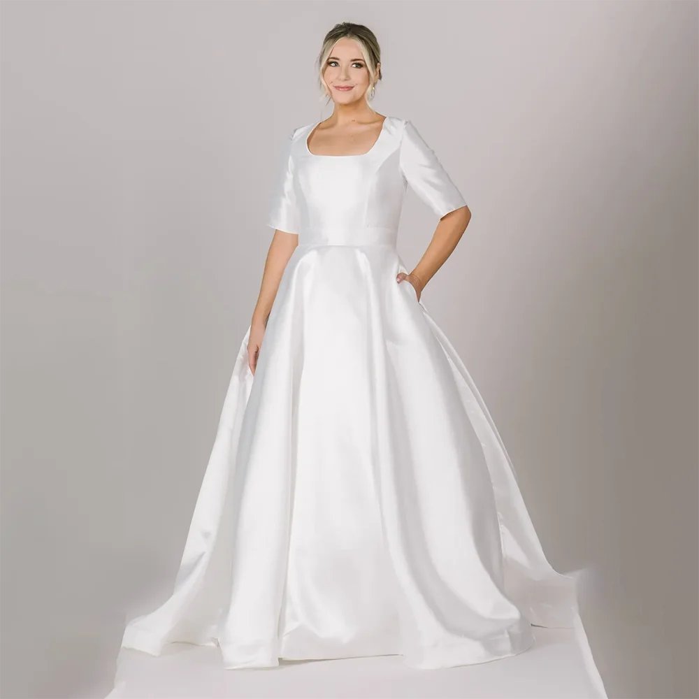 2024 New Simple Satin Modest Wedding Dresses With Half Sleeves Ball Gown Scoop Neck Pockets Buttons Bridal Gowns
2024 New Simple Satin Modest Wedding Dresses With Half Sleeves Ball Gown Scoop Neck Pockets Buttons Bridal Gowns