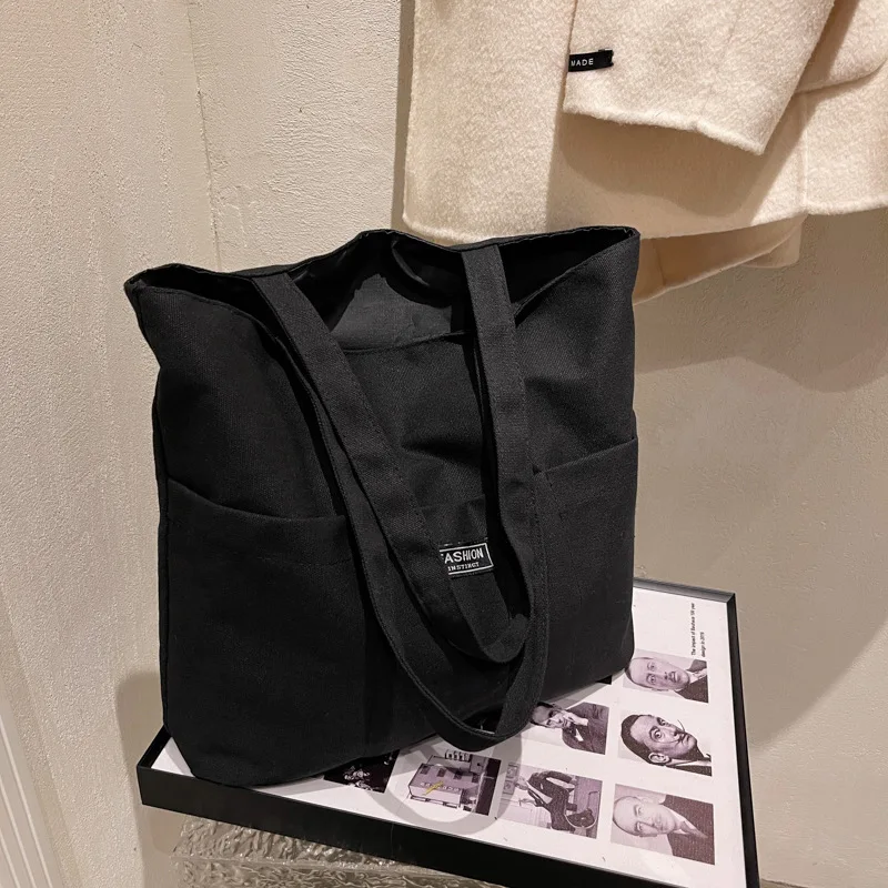 2024 Women's New Korean Edition Instagram Canvas Bag Large Capacity Tote Bag Portable One Shoulder Art Gift Shopping Handbag
2024 Women's New Korean Edition Instagram Canvas Bag Large Capacity Tote Bag Portable One Shoulder Art Gift Shopping Handbag