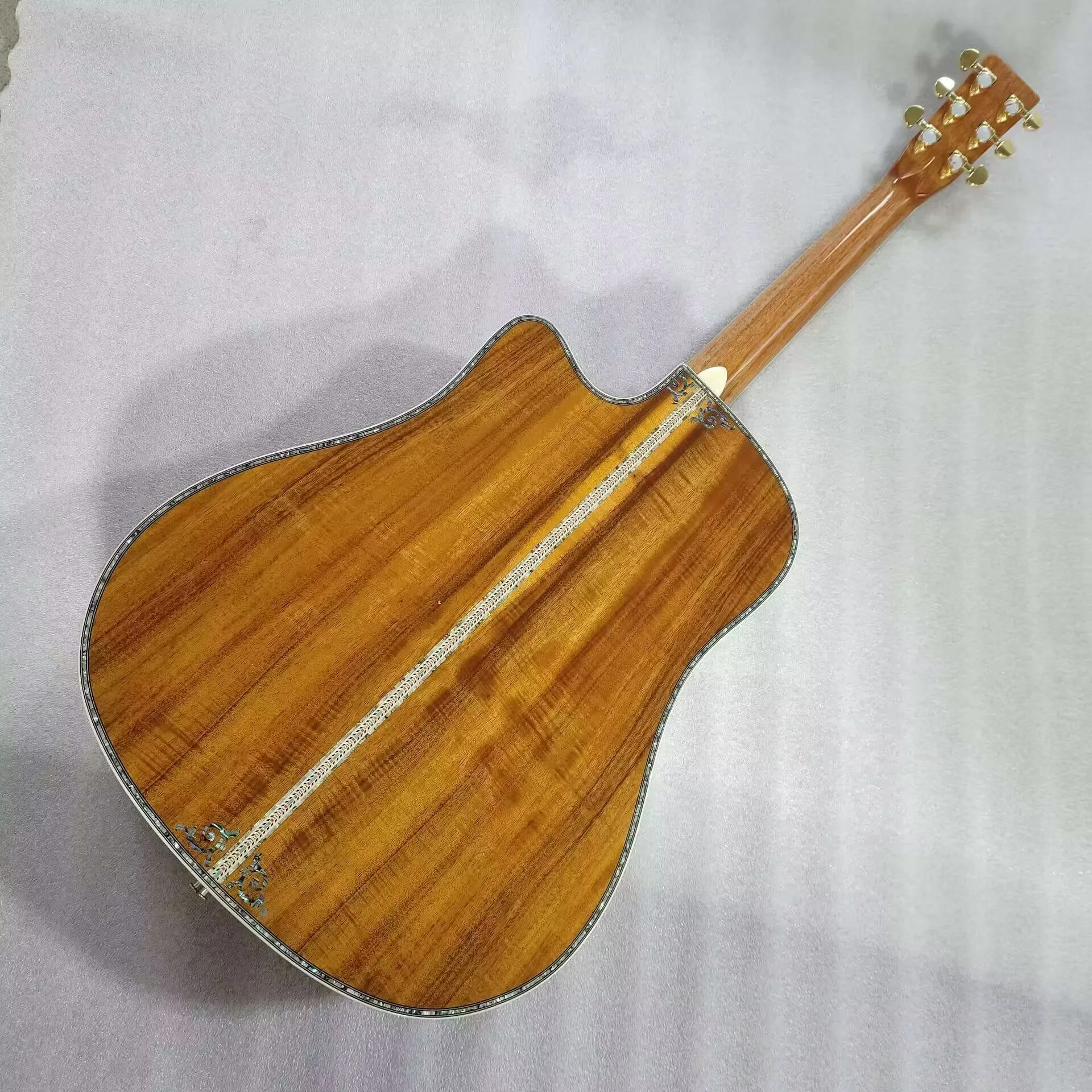 professional koa wood dreadnought acoustic guitar with cutaway fancy abalone inlay
professional koa wood dreadnought acoustic guitar with cutaway fancy abalone inlay