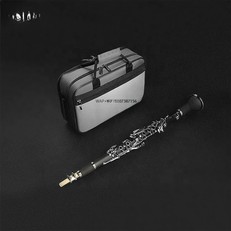 Деревянный музыкальный инструмент для кларнета из черного дерева, 17 клавиш, Bb, для начинающих и профессионалов
Деревянный музыкальный инструмент для кларнета из черного дерева, 17 клавиш, Bb, для начинающих и профессионалов