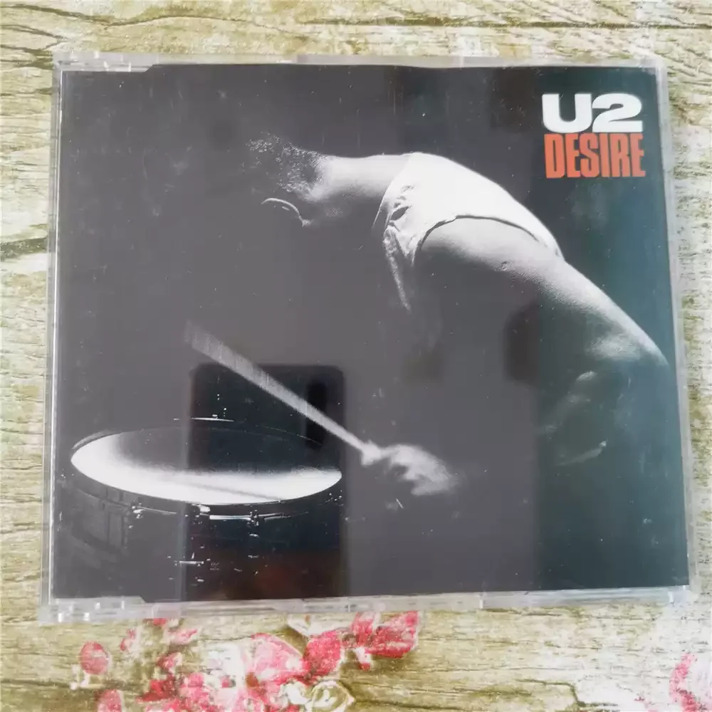 CD U2 Desire As The Lead Single From The Album "Rattle and Hum", It Was U2's First UK Chart-topping Single
CD U2 Desire As The Lead Single From The Album "Rattle and Hum", It Was U2's First UK Chart-topping Single