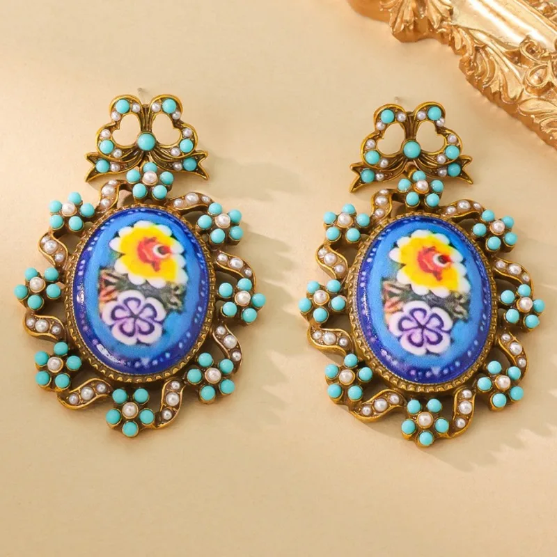 Retro Style Exquisite Mini Turquoise Flower Enamel Painted Pearl Elegant Flower Hollow Niche Women's Earrings Indian Style
Retro Style Exquisite Mini Turquoise Flower Enamel Painted Pearl Elegant Flower Hollow Niche Women's Earrings Indian Style
