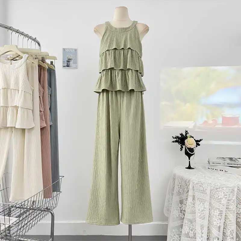 Women Summer Solid Color Suit New O-neck Sleeveless Ruffles Tops And Elastic Waist Wide Leg Pants Cute 2pcs Female Clothes
Women Summer Solid Color Suit New O-neck Sleeveless Ruffles Tops And Elastic Waist Wide Leg Pants Cute 2pcs Female Clothes