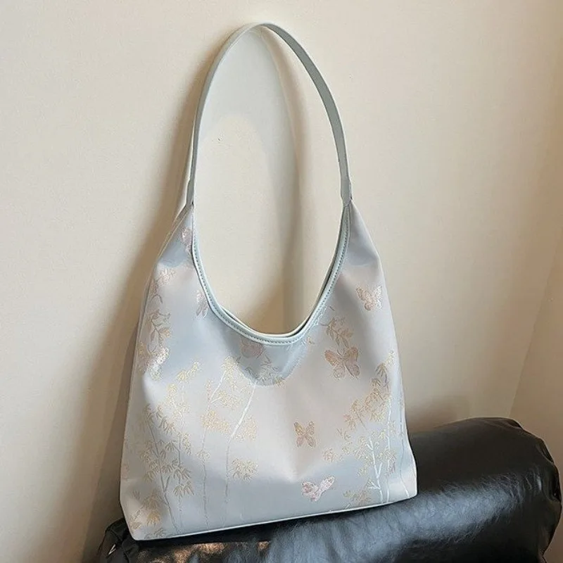 Trendy Simple Satchel For Women As A Crossbody And Shoulder Bag With Textured Finish Includes Spacious Diaper Bag Function
Trendy Simple Satchel For Women As A Crossbody And Shoulder Bag With Textured Finish Includes Spacious Diaper Bag Function
