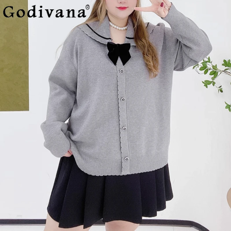 Large Size Women Autumn Cute Peter Pan Collar Long Sleeve Loose Knitted Cardigan Sweet College Solid Color Bow Bottom Sweater
Large Size Women Autumn Cute Peter Pan Collar Long Sleeve Loose Knitted Cardigan Sweet College Solid Color Bow Bottom Sweater