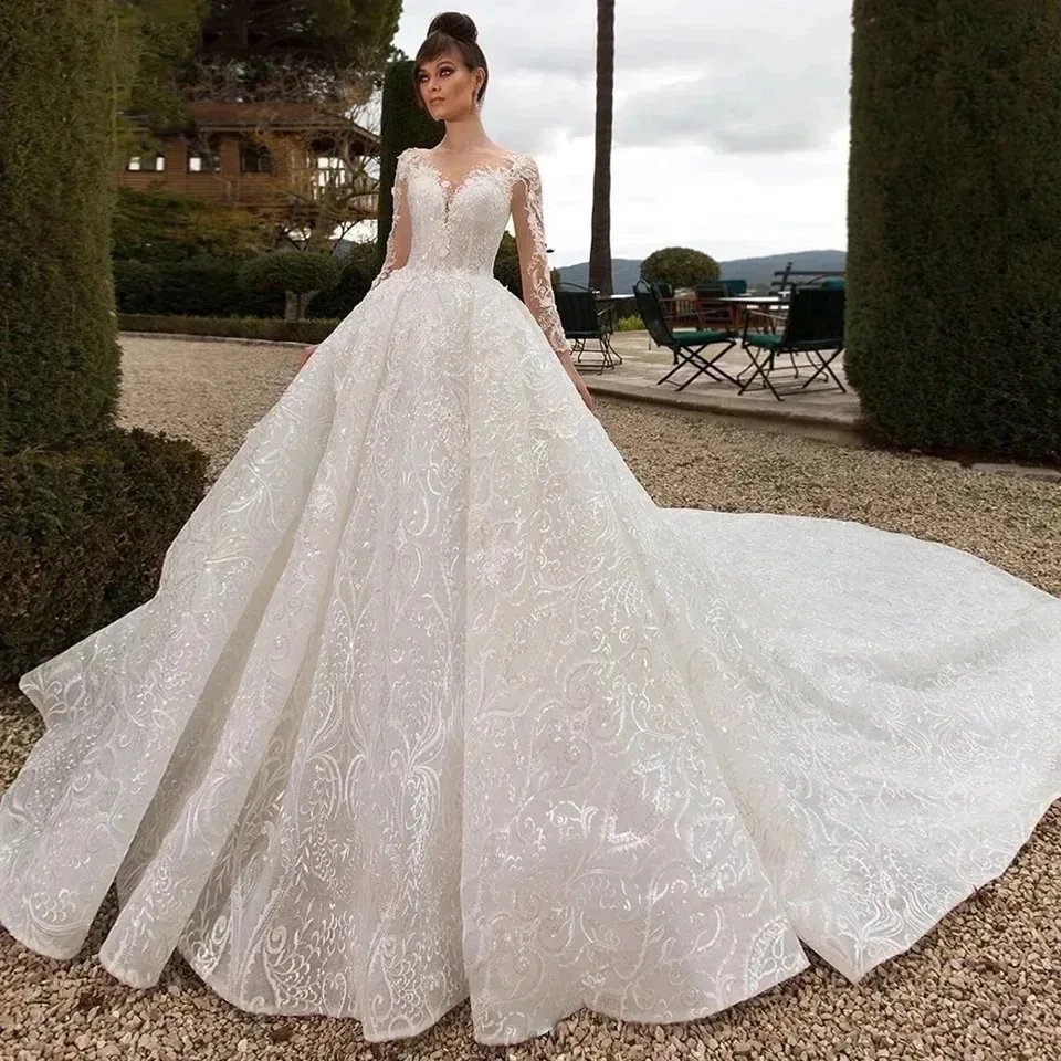 Customize Lvory Scoop Neck Wedding Dresses Appliques A-Line Floor Length Sweep Train Long Sleeves Buttons Bridal Gown
Customize Lvory Scoop Neck Wedding Dresses Appliques A-Line Floor Length Sweep Train Long Sleeves Buttons Bridal Gown