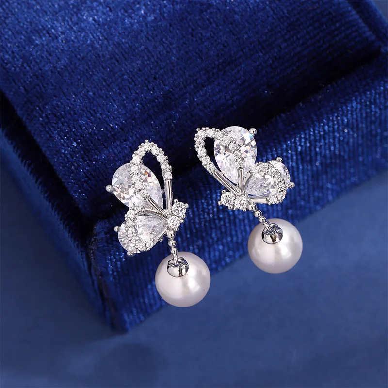 925 silver needle geometric butterfly pearl exquisite and fashionable forest-style high-end feel niche and versatile ear studs
925 silver needle geometric butterfly pearl exquisite and fashionable forest-style high-end feel niche and versatile ear studs