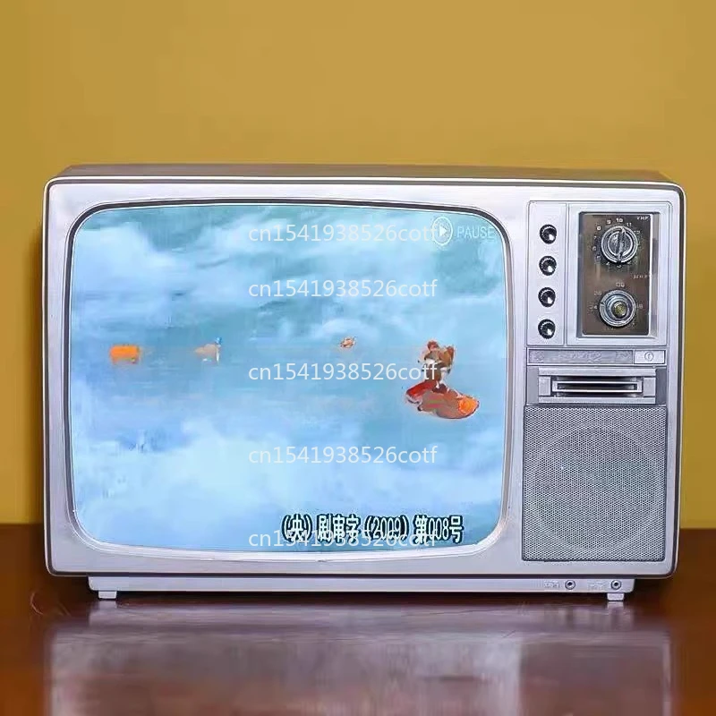 Old style TV 7080 retro nostalgic black and white machine, film and television props, folk old objects, ornaments
Old style TV 7080 retro nostalgic black and white machine, film and television props, folk old objects, ornaments