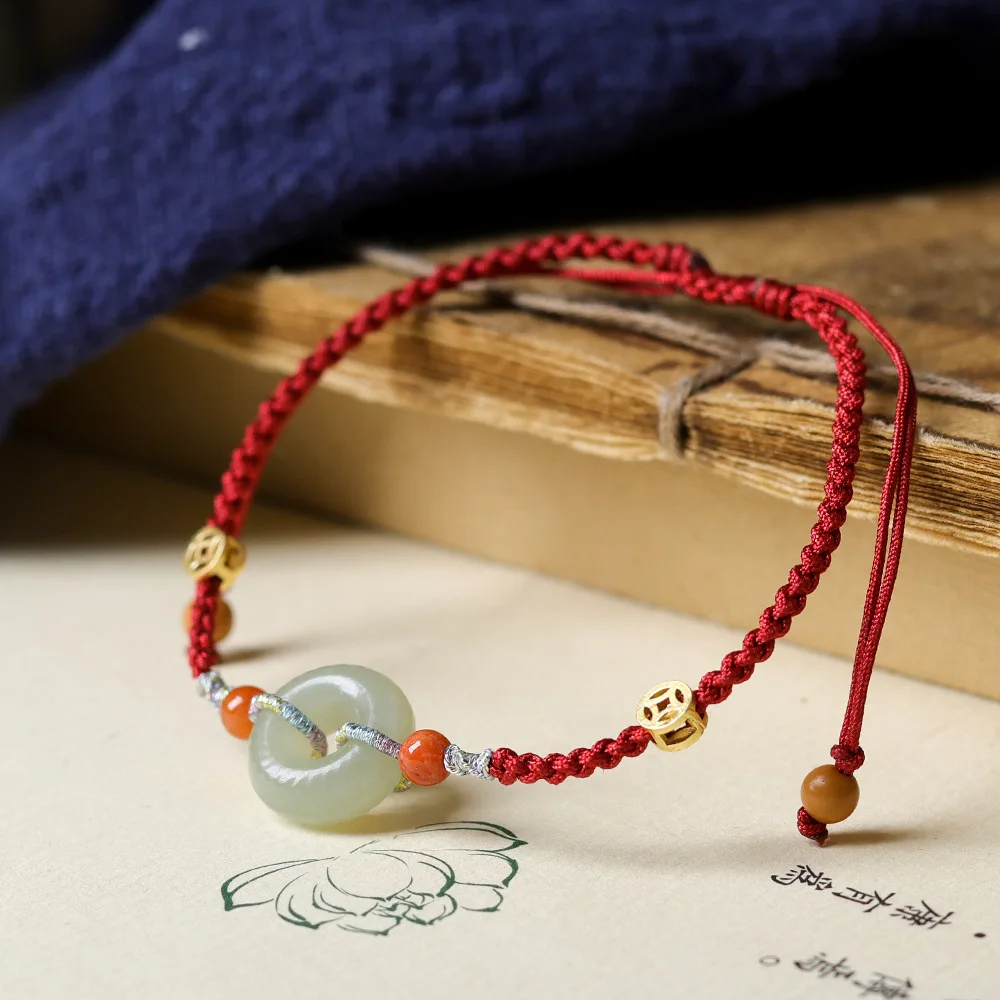 Handwoven Hetian Jade Peace Buckle Chinese New Year Red Bracelet Chinese Style Zodiac Year Wristband Gifts
Handwoven Hetian Jade Peace Buckle Chinese New Year Red Bracelet Chinese Style Zodiac Year Wristband Gifts