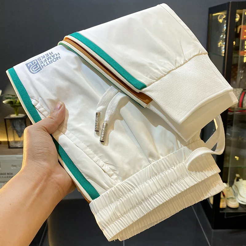 White Ice Silk Casual Men'S Summer 2024 New Fashionable Ultra Thin New Tie Feet Sports Trendy Brand Nine Split Pants
White Ice Silk Casual Men'S Summer 2024 New Fashionable Ultra Thin New Tie Feet Sports Trendy Brand Nine Split Pants