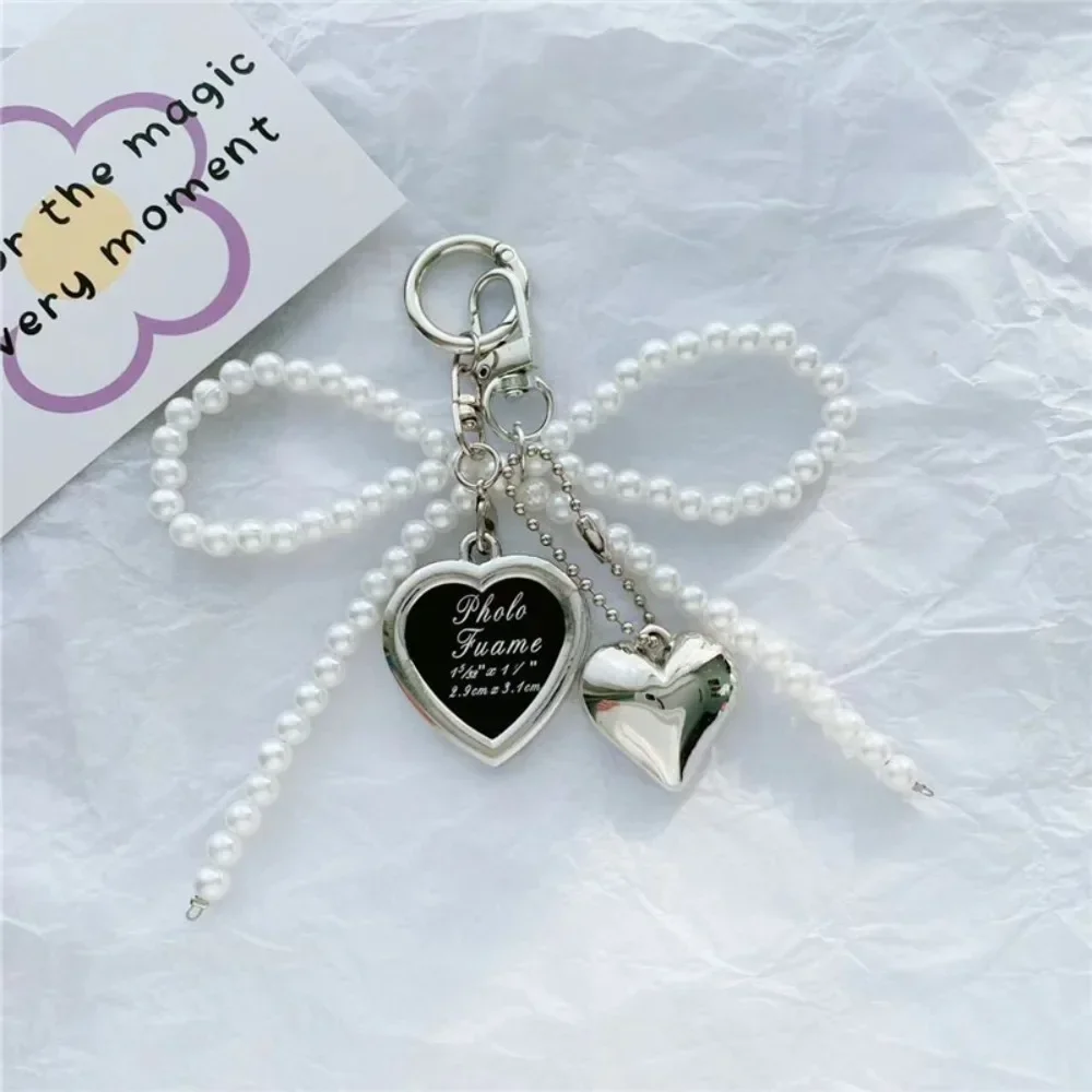 Cute Bowknot Heart Keychain Imitation Pearl Delicate Phone Lanyard Creative Key Chain Bag Pendant Women Girl
Cute Bowknot Heart Keychain Imitation Pearl Delicate Phone Lanyard Creative Key Chain Bag Pendant Women Girl