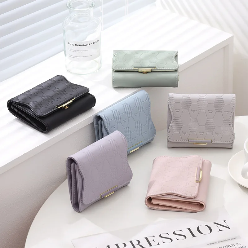 PU leather short clasp women's purse three fold multi card folding coin pocket change collection student purse
PU leather short clasp women's purse three fold multi card folding coin pocket change collection student purse