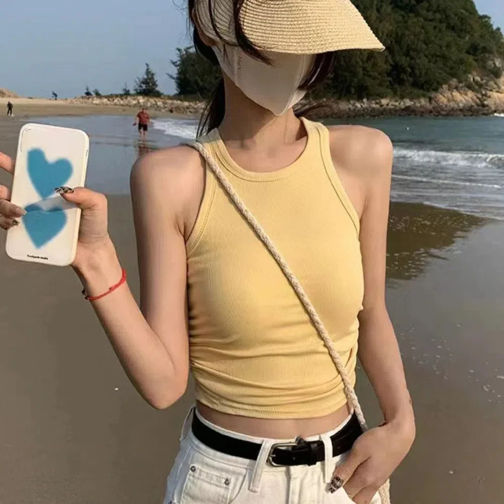 Милый укороченный топ без рукавов с лямкой на шее, облегающий топ на бретелях для милых девочек, пляжная одежда, майки, майки на бретельках с подушечками, лето 
Милый укороченный топ без рукавов с лямкой на шее, облегающий топ на бретелях для милых девочек, пляжная одежда, майки, майки на бретельках с подушечками, лето