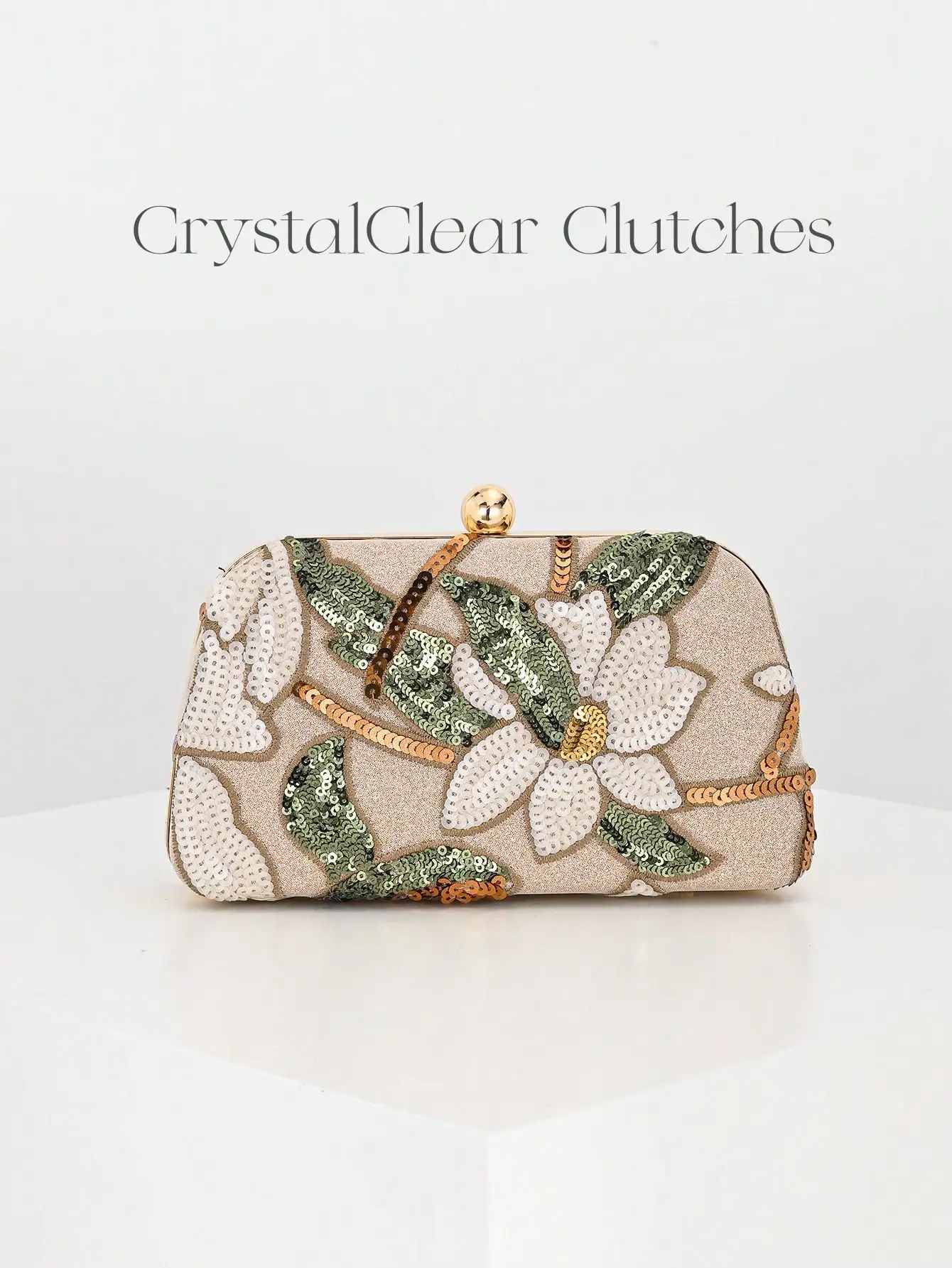 Сумка-клатч с цветочным узором из пайеток и золотой застежкой-пряжкой
Сумка-клатч с цветочным узором из пайеток и золотой застежкой-пряжкой
